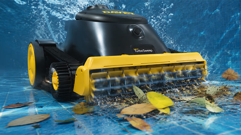 Davey TurboSweep active scrubbing brush lifting leaves and debris from the pool floor